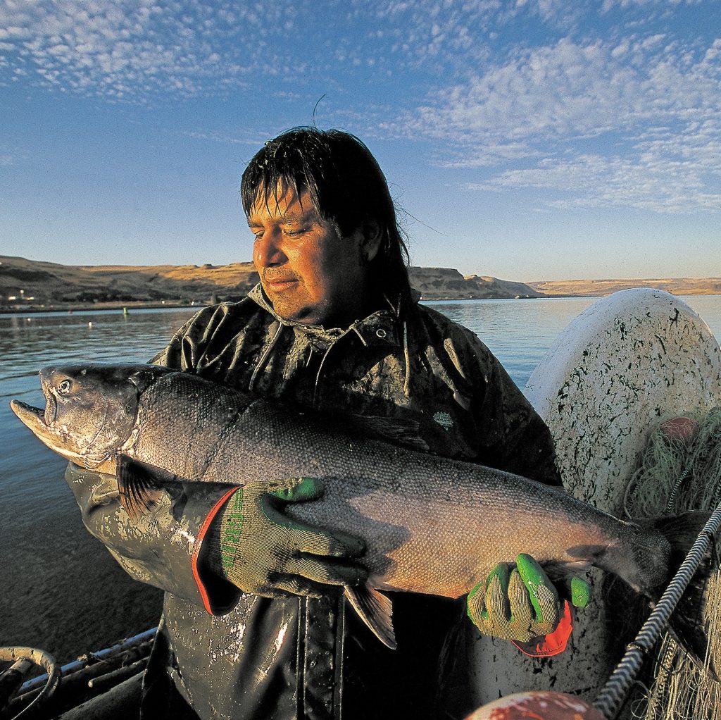 Bobby Begay holding a salmon
