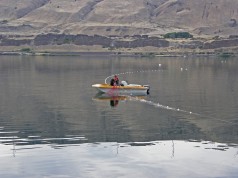 Fishers check their net on the Columbia River.